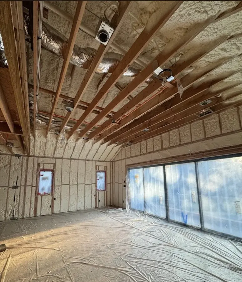Interior walls and ceiling insulated with spray foam during new construction in Pinellas Park